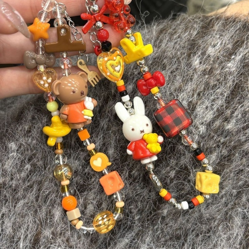 زينة كرتونية معلقة من الخرز بت - مراجعة Photography Journalism وسعره
